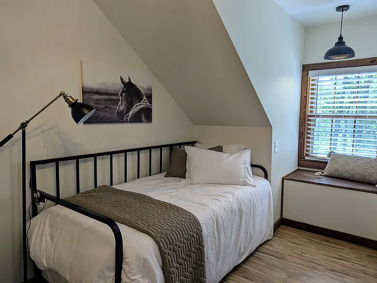 UPSTAIRS BEDROOM 2 (sleeps 4 total): Twin Size Daybed with Twin Pullout Trundle Bed (beds can be connected to convert to 1 King Bed)