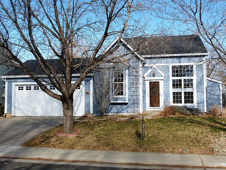 Street view of 521 W. Hackberry. Mature ash provides plenty of shade in summer.