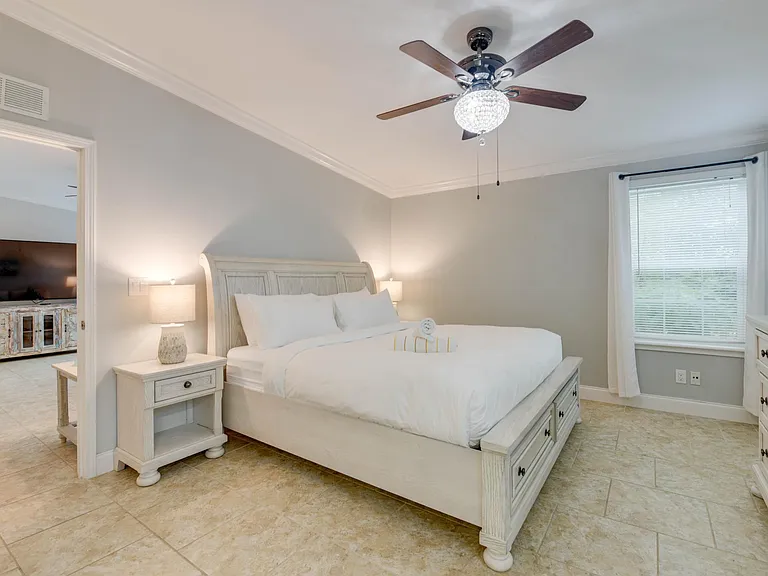 Bedroom 1 - master bedroom with king bed, walk-in closet, & en-suite bathroom