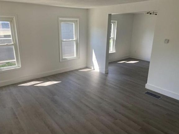 Living room with access to the dining room.