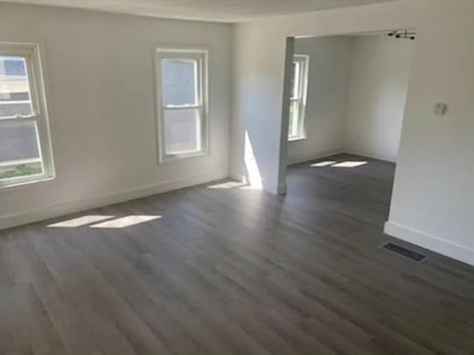 Living room with access to the dining room.