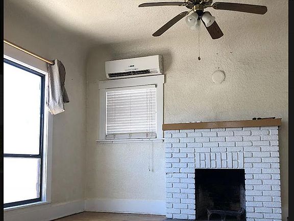 Living room with a working fireplace