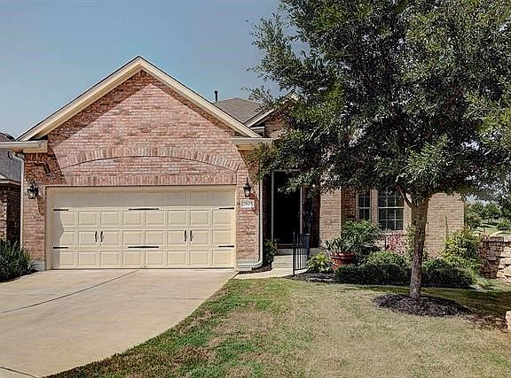All 4 side brick elevation! gutters and automatic sprinkler system.