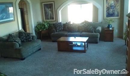 Living
						:
						Spacious Living Room with vaulted ceilings and window seat