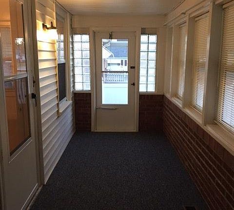 Enclosed porch provides extended living space