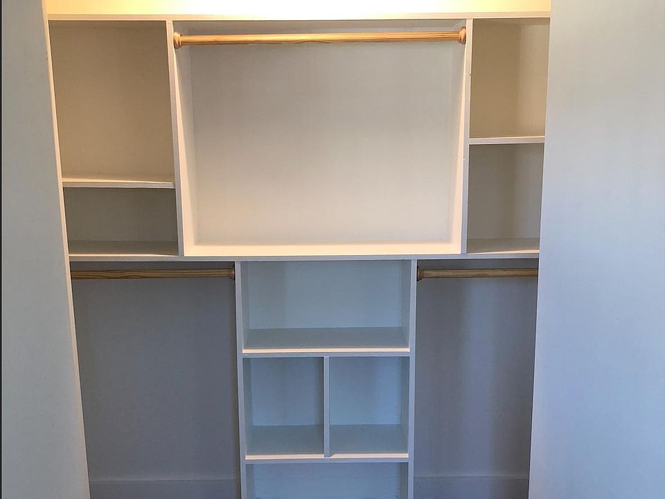 Large reach in closet with built-ins