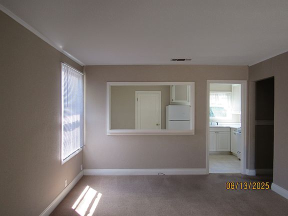 Living room facing kitchen