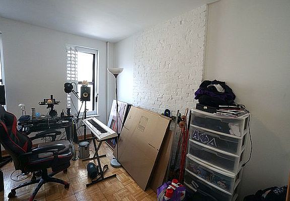 2nd image of 261 E 10th St APT 9