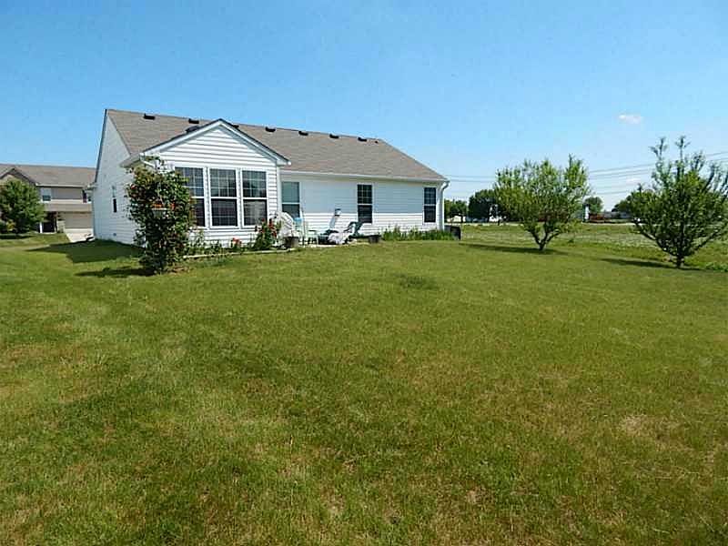 Exterior Front. Rear view of this spacious lot offering a storage barn