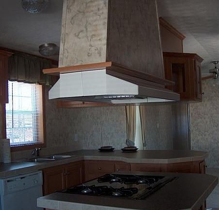 built in stove w cabinets