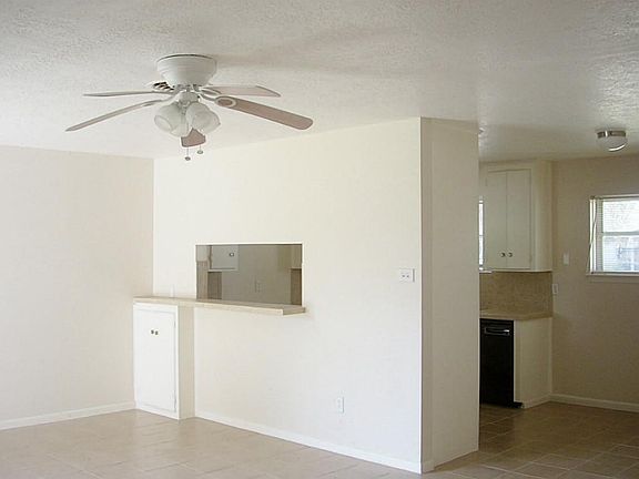 VIEW AND OF KITCHEN AND PART OF THE FORMAL DIDNIG AREA