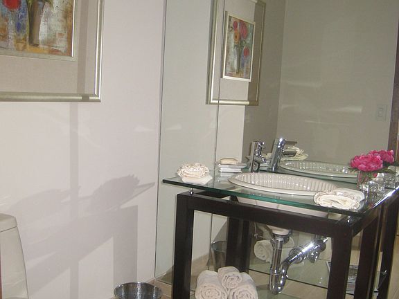 Powder Rm off foyer with gleaming new flooring...