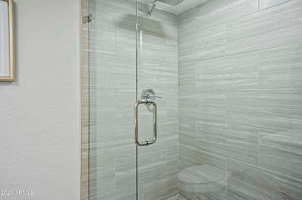 Large, walk in shower with beautiful glass shower enclosure