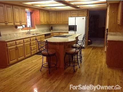 Huge Kitchen
						:
						Expands/adjoins kitchen nook for a second large eating area. Not just a nook !