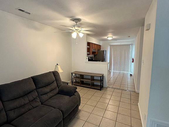 Living room into dining area and kitchen