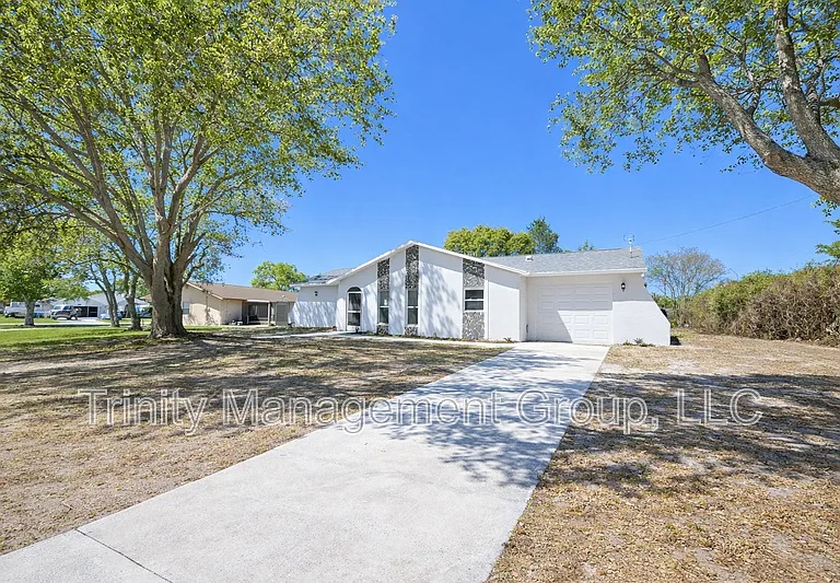 10449 Mayflower Rd — Photo 2