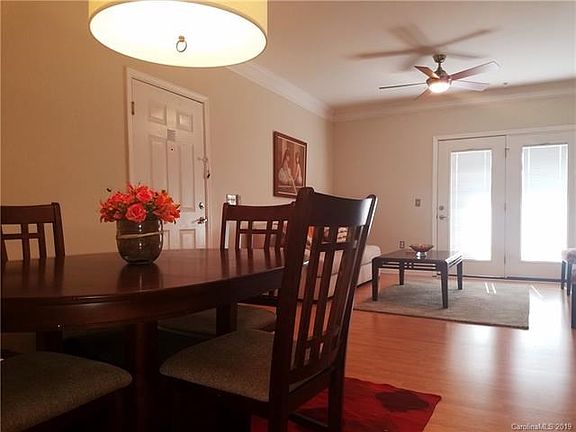 Dining Room to Living Room and Covered Balcony