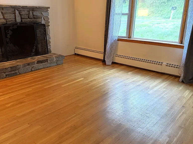 Large Living room with picture window and fireplace