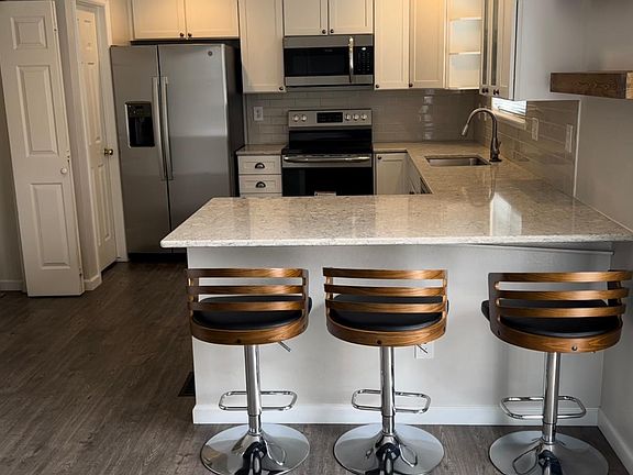 Current Appliances. Quartz countertop.