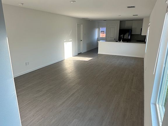Foyer Overlooking Open Concept Living Area