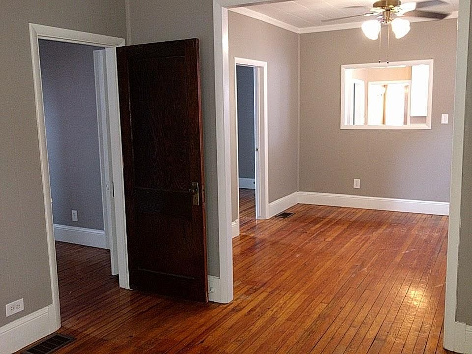 Living/Dining rooms with 2 bedrooms and pass through to kitchen.