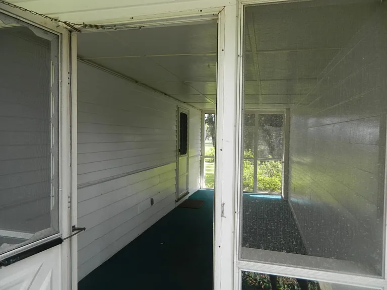 screened in breezeway and side entrance