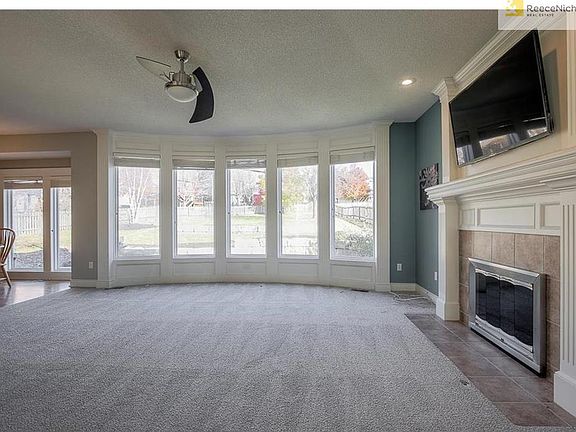 Beautiful bay windows frame Family Room!