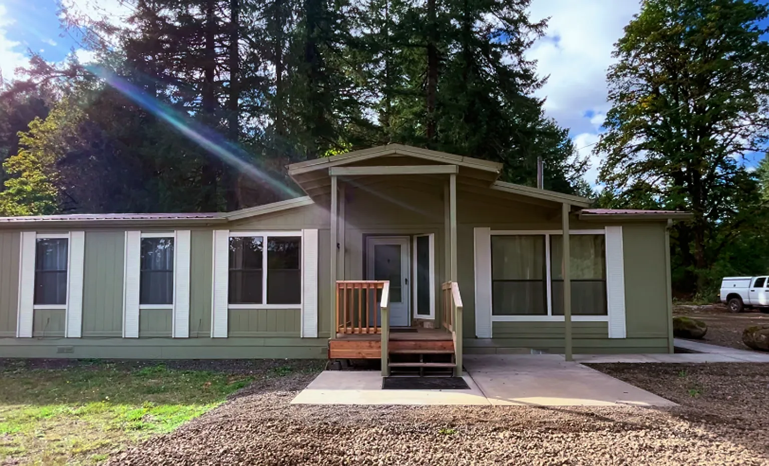 Charming 2-Bed, 2-Bath Country Retreat with Modern Comforts and Open Layout — Photo 1