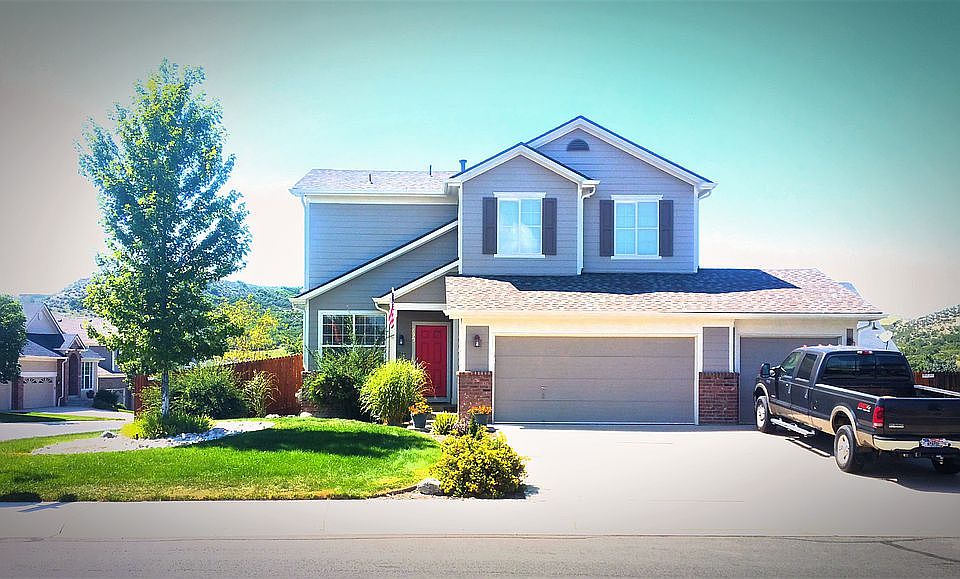 Front with 3 car Garages