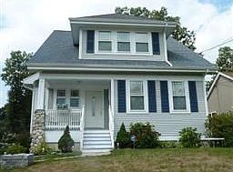 Gracious front porch, fieldstone accents