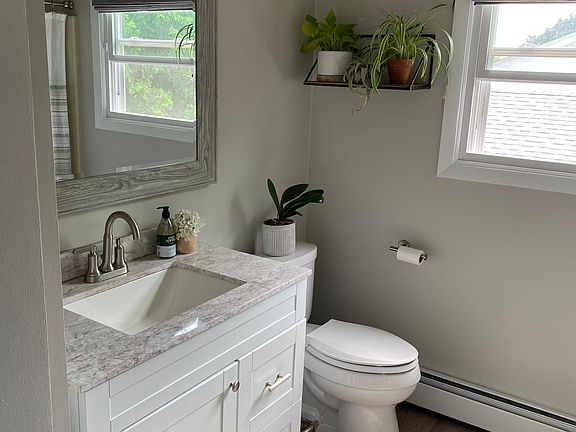 Bathroom with a full sized closet