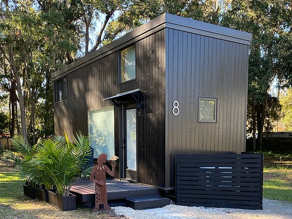 Escaperoo tiny house has parking for 1 - 2 cars. A shady & private setting in New Smyrna Beach, Florida