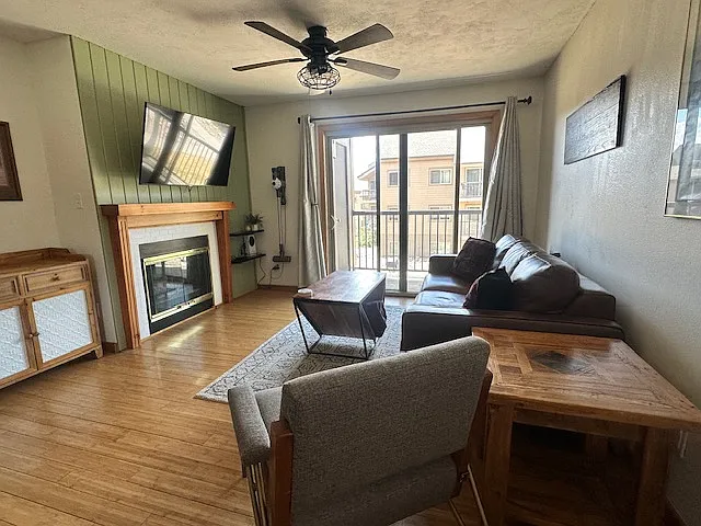Balcony connecting to the living room with additional storage closet space.