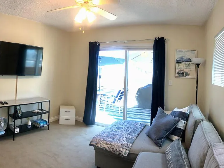 bedroom 2/den with convertible queen sofa sleeper.