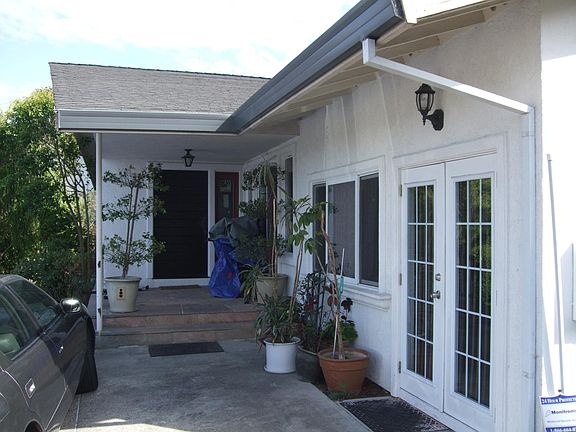 Front Entry with Double French Doors outside and off of Livi