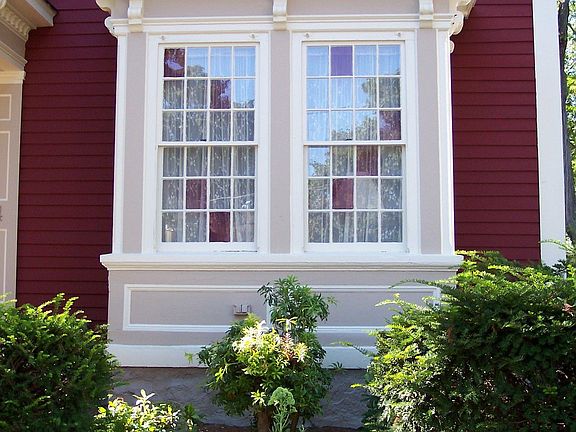 Bay window with original cranberry glass