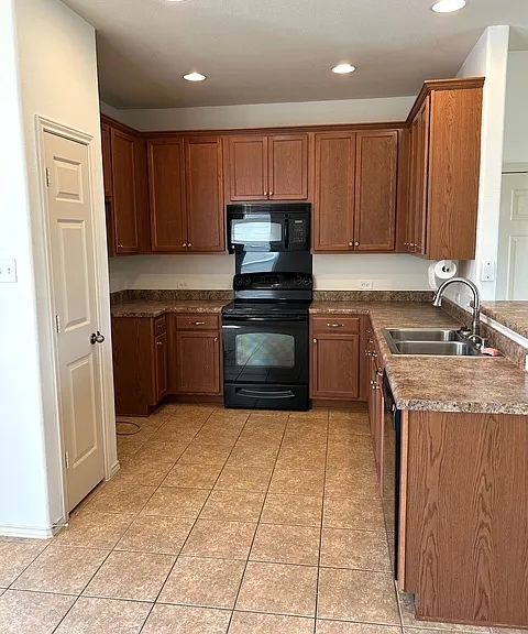 Recessed lighting and oversized cabinets