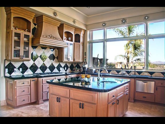 Granite countertops and designer cabinets.