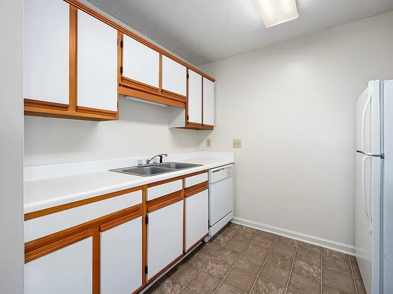 Enjoy bright kitchens featuring white cabinetry and all appliances included, professionally operated by Highlands Vista Group.