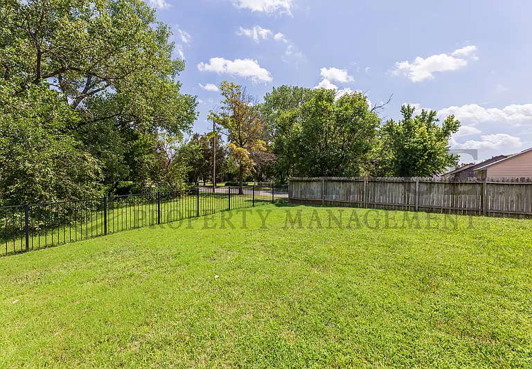 6534 E 39th Ct N — Photo 3