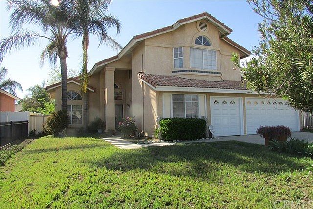 Nice home, has wrought Iron fencing around the front