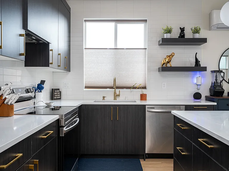 Modern finishes, quartz counter tops, extensive, custom tile