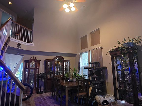 Our amazing and huge two-story living room area as you walk through the front door. All bedrooms are located upstairs.