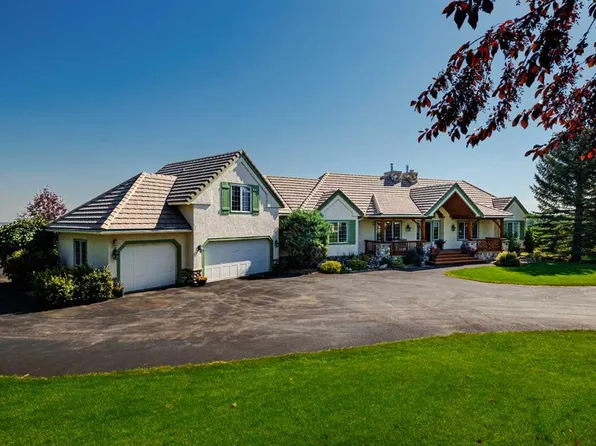 98 SW Equestrian Dr, Rocky View County, AB T3R 1C9