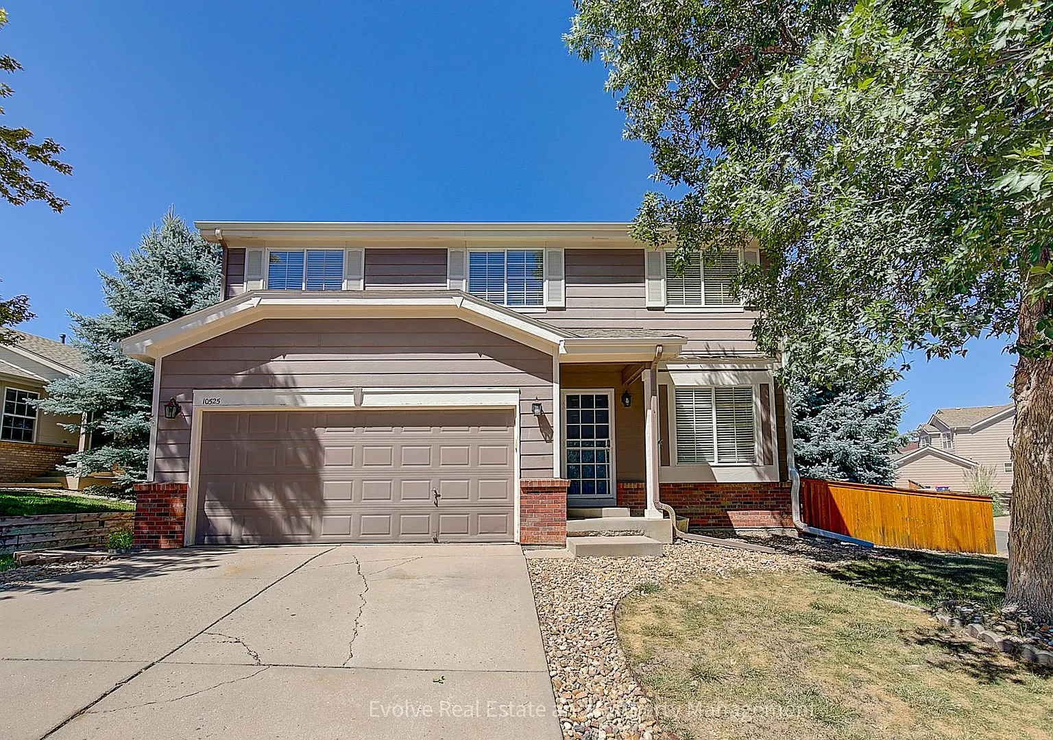 Evolve Real Estate: Beautiful 4-Bedroom Home in Lone Tree with Finished Basement! Available Septe... — Photo 2