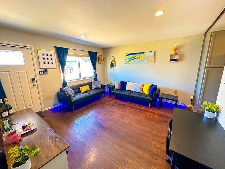 Gather the family in our inviting living room with plush couches and a TV for quality bonding time.
