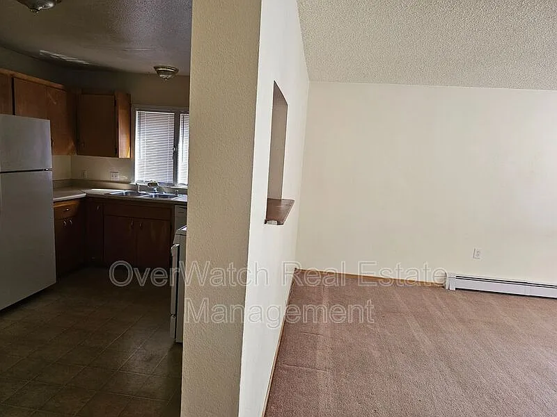 Building Photo - 1509 W 45th Ave #4