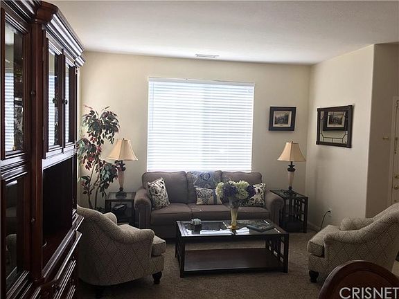 Living room and entire home has carpet less than o