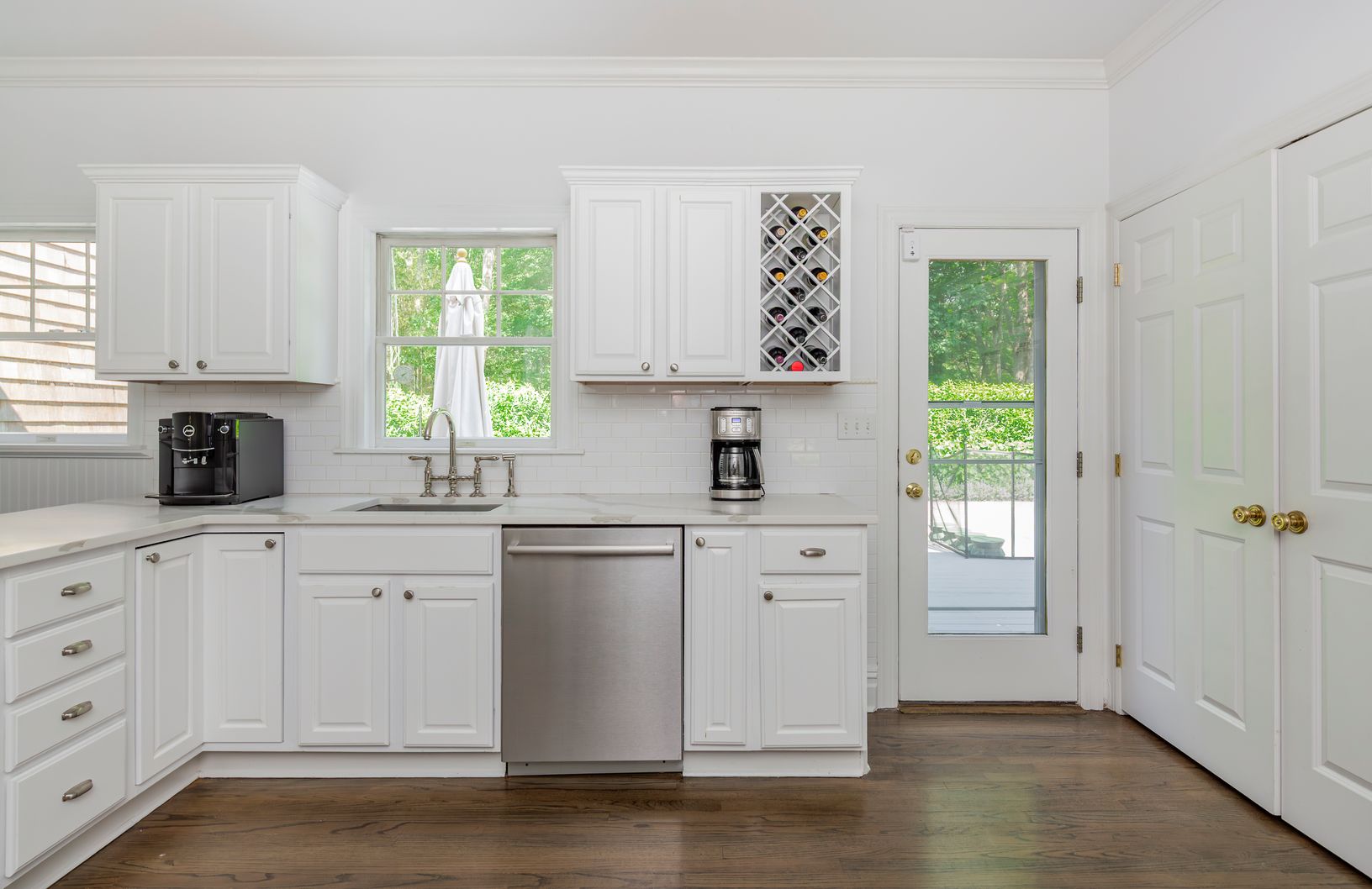  Kitchen with access to rear deck and pool
