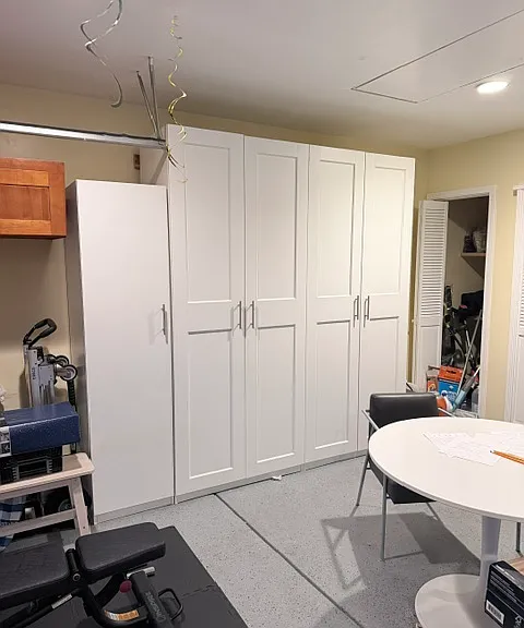 Finished garage with cabinets